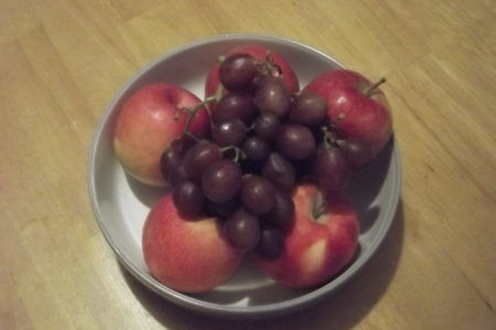 Fruit Bowl With Apples And Grapes